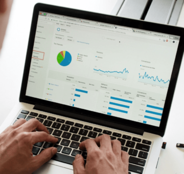 man conducting seo site audit on computer