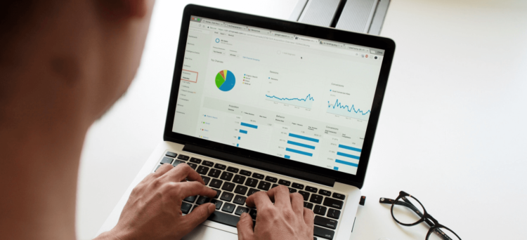 man conducting seo site audit on computer