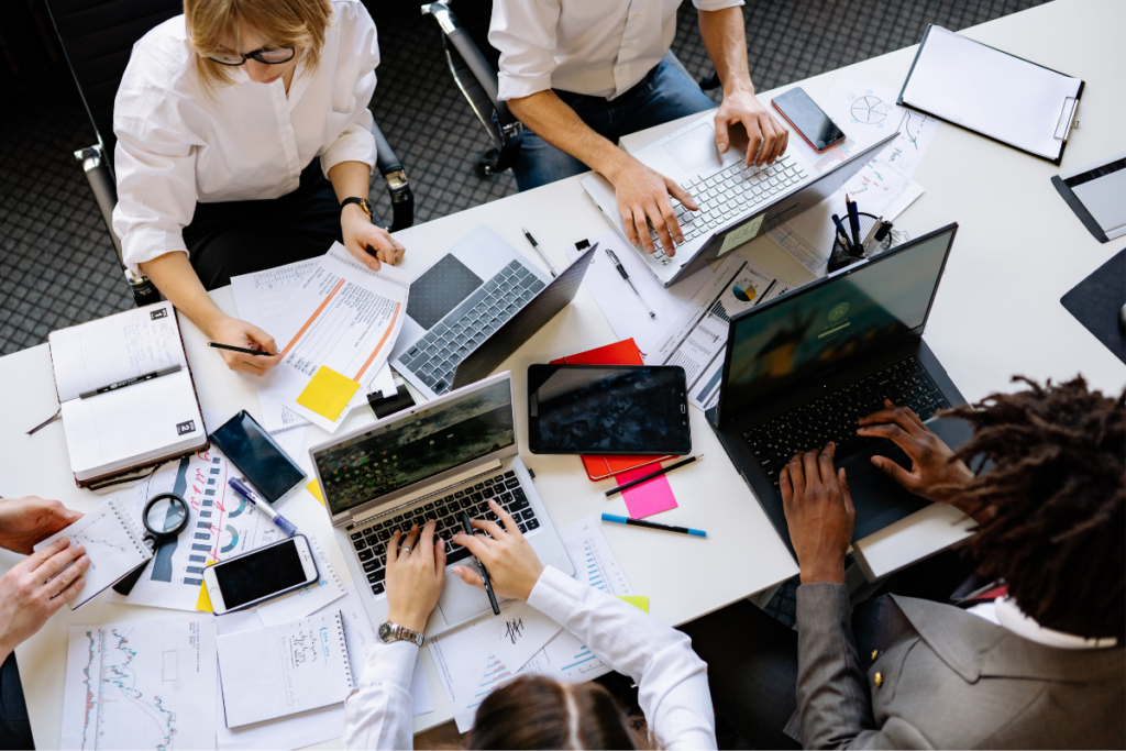 Group of coworkers working on laptops.