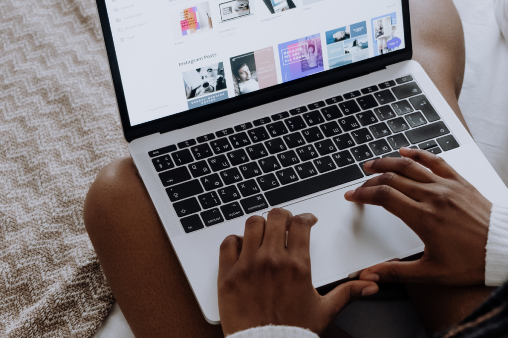 Person typing on a laptop.